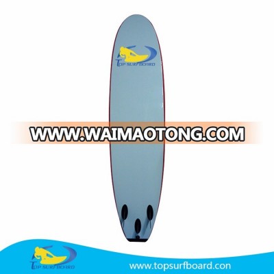 A decorative foam surfboard in surf shop online